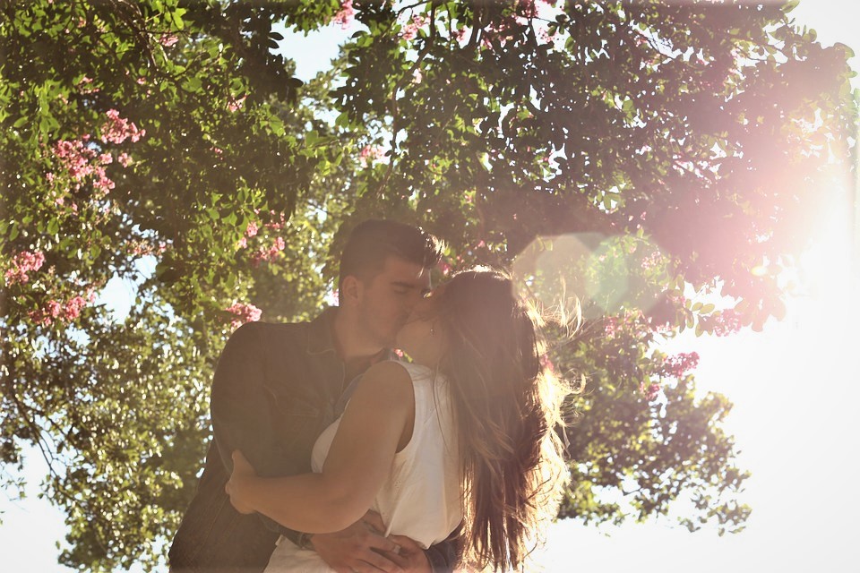 Spring couple kissing